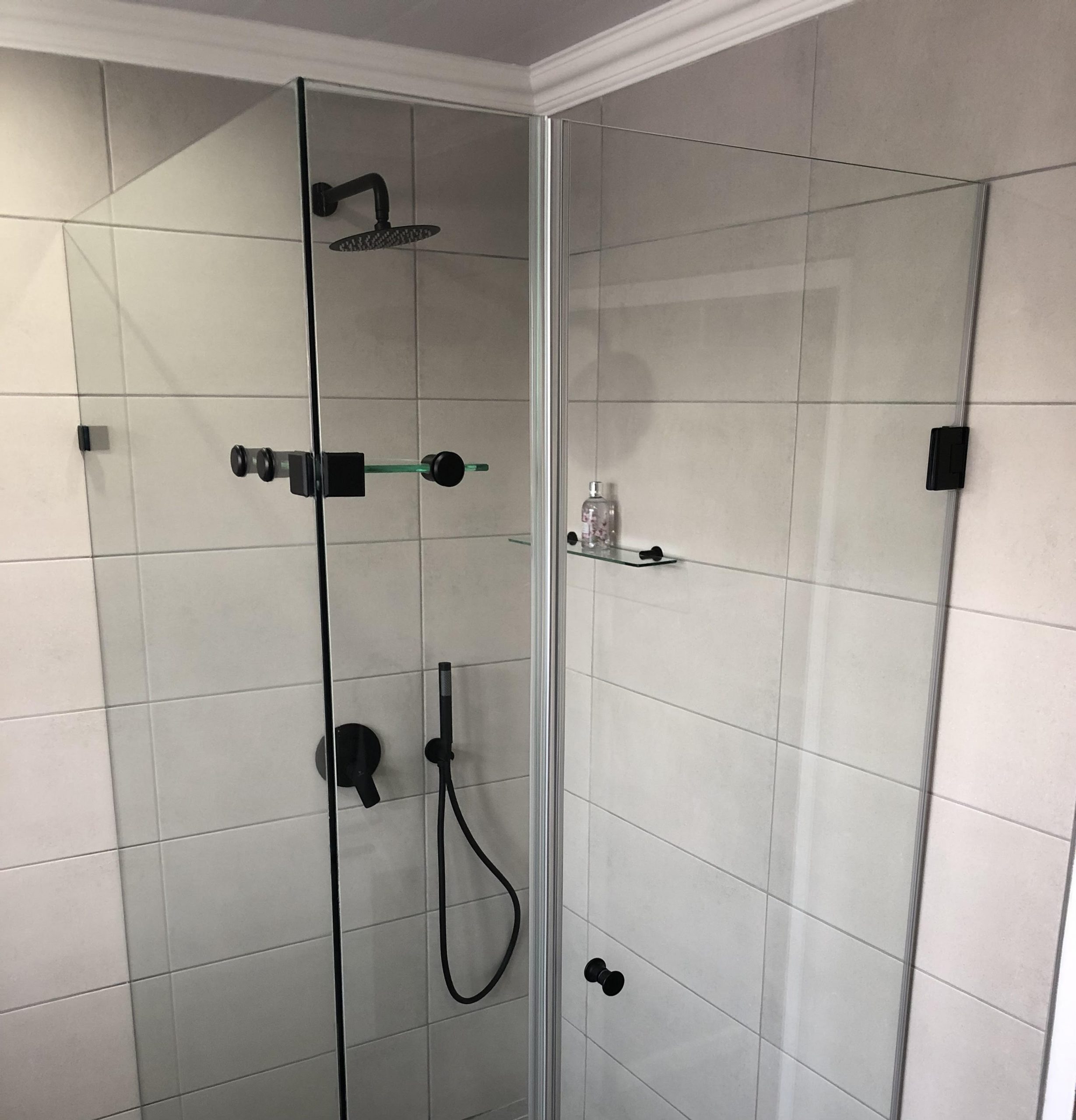 Modern glass shower bathroom renovation by Bathroom Galore