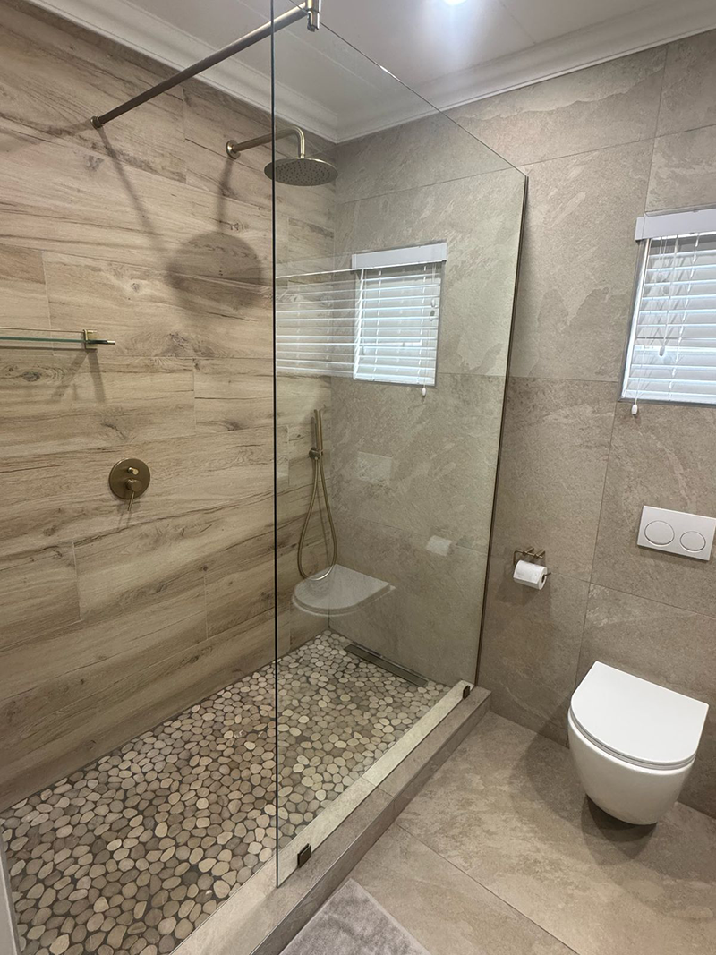 Walk-in glass shower bathroom renovation