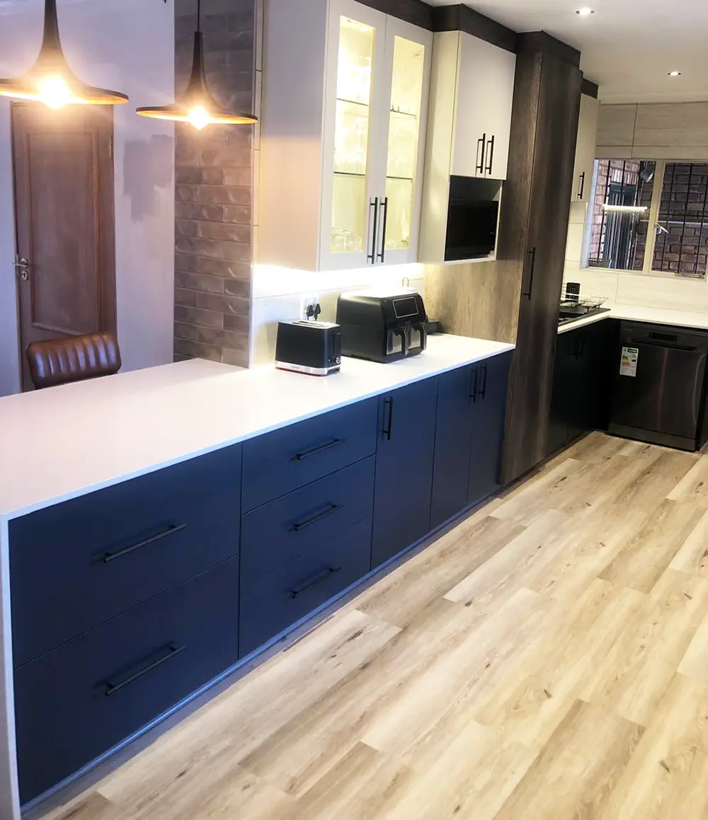 Modern charcoal and white kitchen renovation by Bathroom Galore
